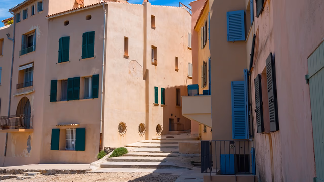 The harbour at Saint-Tropez with boats moored in front of the colourful old town, the stretch of coast where most lost ring searches on this gulf begin